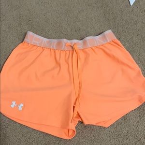 Bright orange under armor shorts